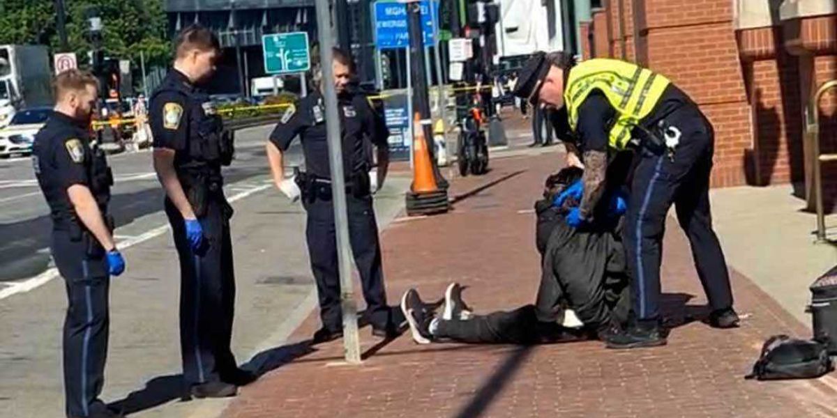 Police say a man seized a Boston officer's gun and shot himself near Massachusetts General Hospital