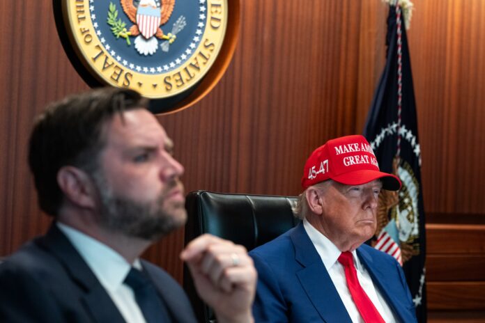 Trump defends US strikes on Iran as intel assessment stirs debate