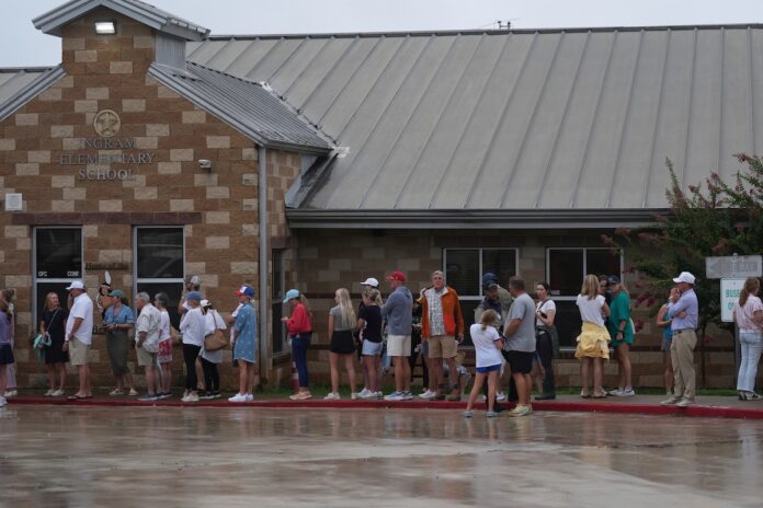 Texas families plead for information on at least 23 girls missing from summer camp after floods
