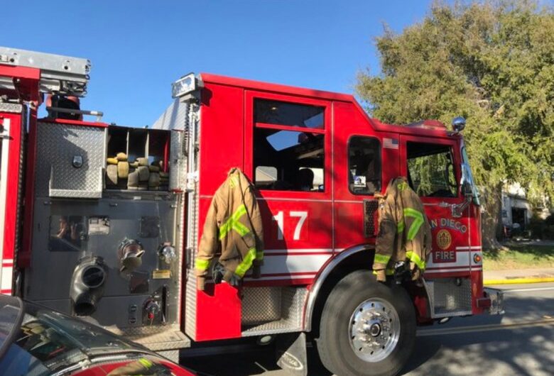 Flames spread from garage to home, drawing firefighters from SD, National City