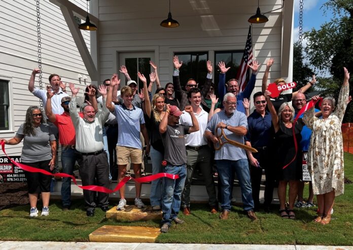 Modtech Homes holds ribbon cutting for West Jarrard Street project